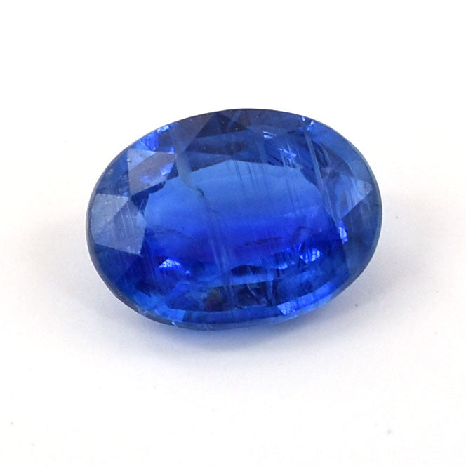 Oval-cut blue gemstone with a brilliant sapphire hue.