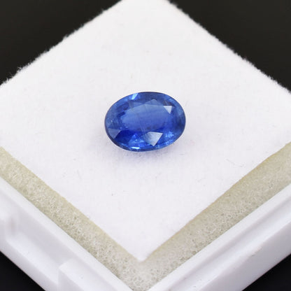 Oval-cut blue sapphire gemstone.