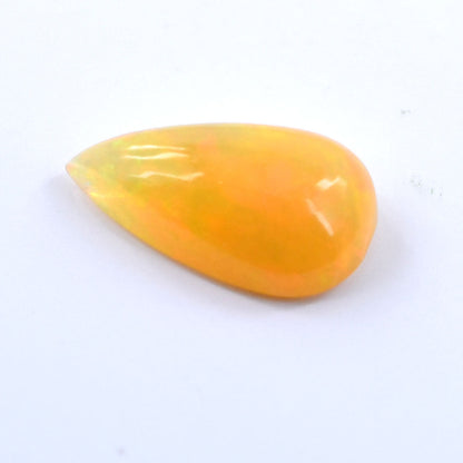 Yellow teardrop-shaped kernel of corn.