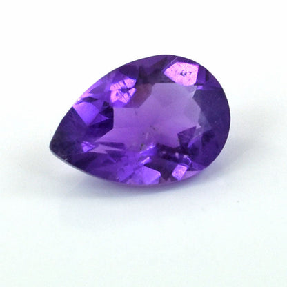 Pear-shaped amethyst gemstone with a deep purple color.