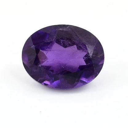 Oval-cut purple gemstone, likely an amethyst.