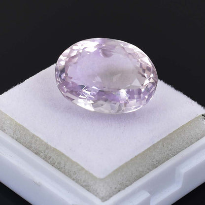 Oval-cut pale purple gemstone, likely an amethyst.