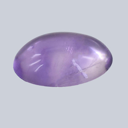 Oval-shaped purple gemstone with a smooth, polished surface.