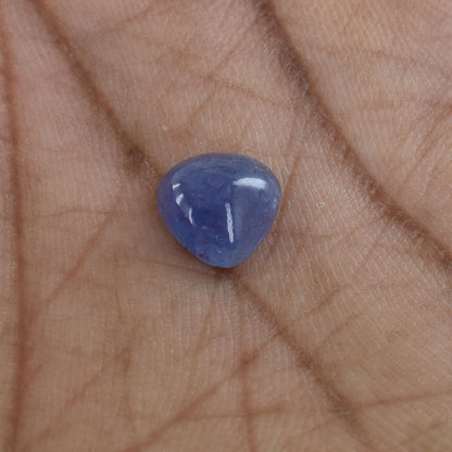 Blue, triangular-shaped gemstone or cabochon.