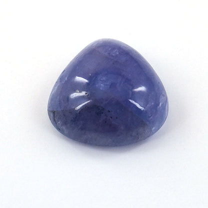 Smooth, rounded blue gemstone with a cabochon cut.