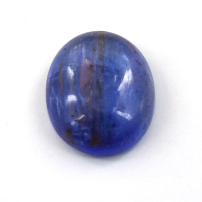 Oval-shaped blue gemstone with subtle darker inclusions.