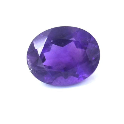 Oval-cut purple gemstone with facets reflecting light.