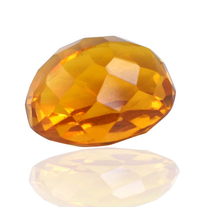 Faceted amber-colored gemstone with a teardrop shape.