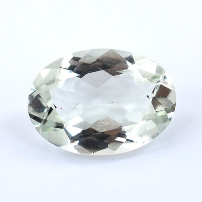 Oval-cut, faceted clear gemstone or crystal.