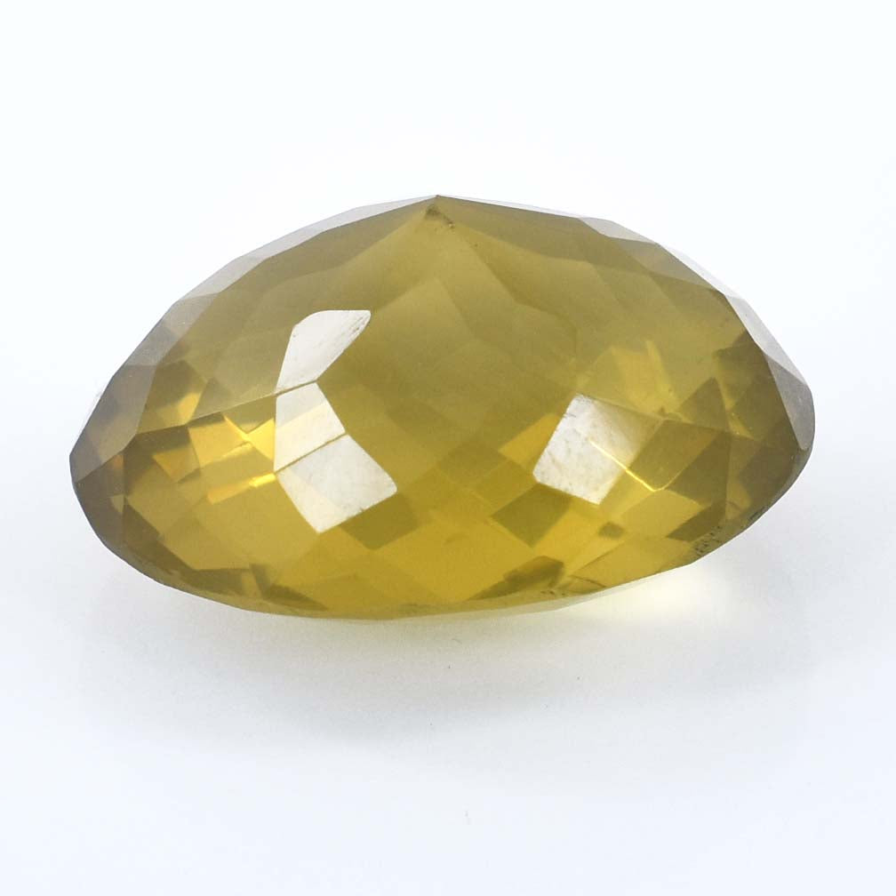 Faceted yellow gemstone with an oval or teardrop shape.