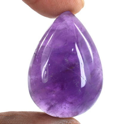 Teardrop-shaped purple gemstone, likely an amethyst.