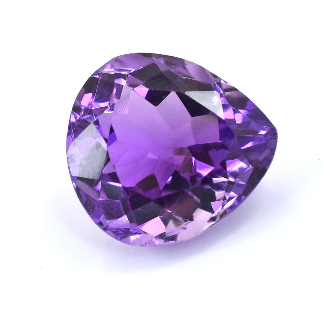 Pear-shaped purple gemstone with faceted cuts.