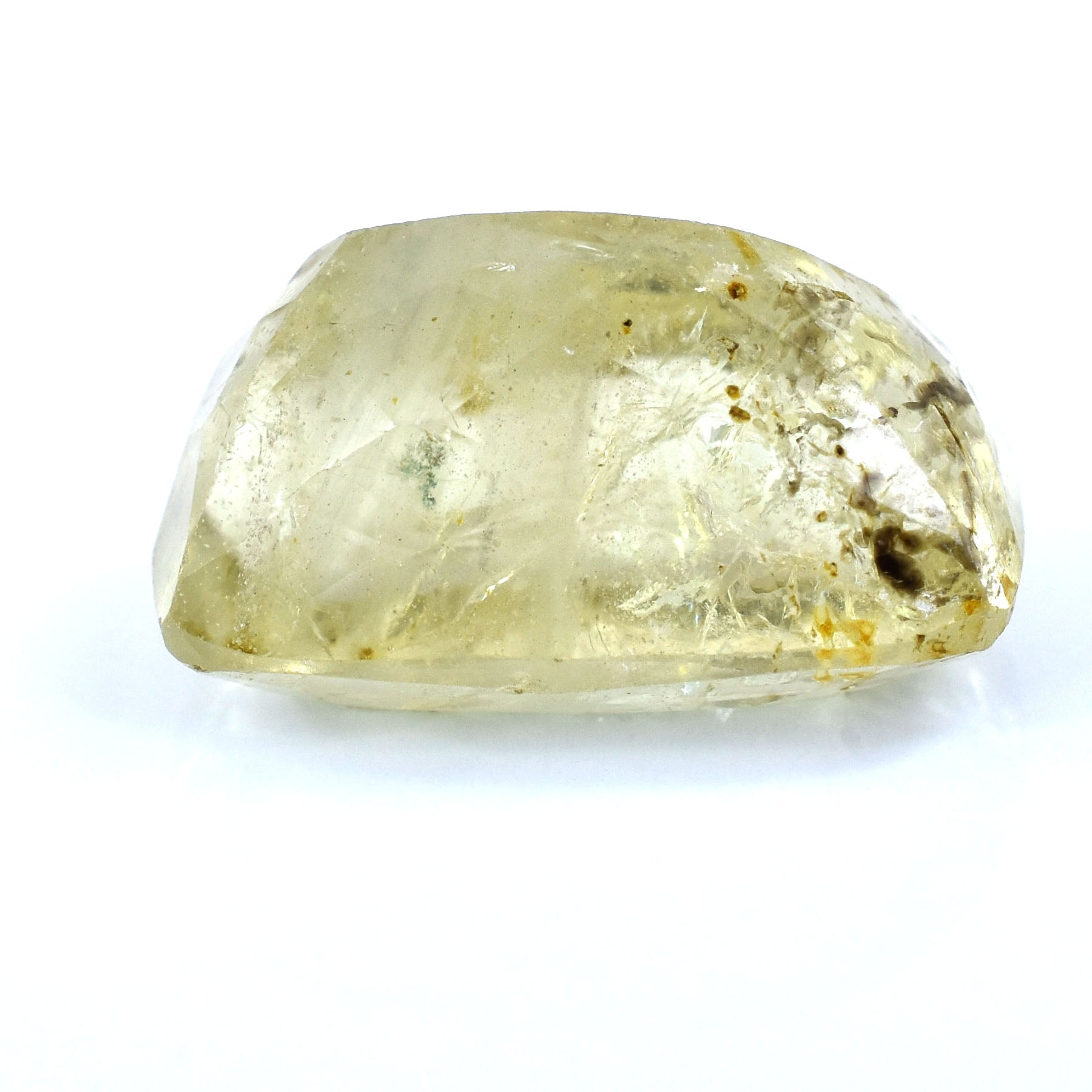 Pale yellow, semi-transparent gemstone with visible inclusions.