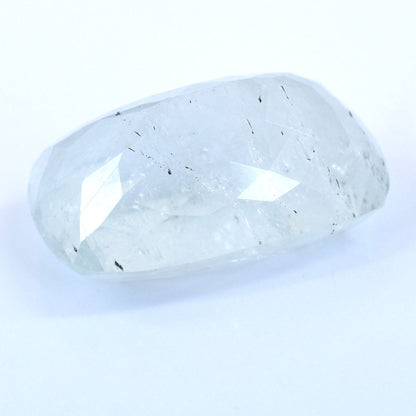 Translucent, irregularly shaped crystal or gemstone with visible inclusions.