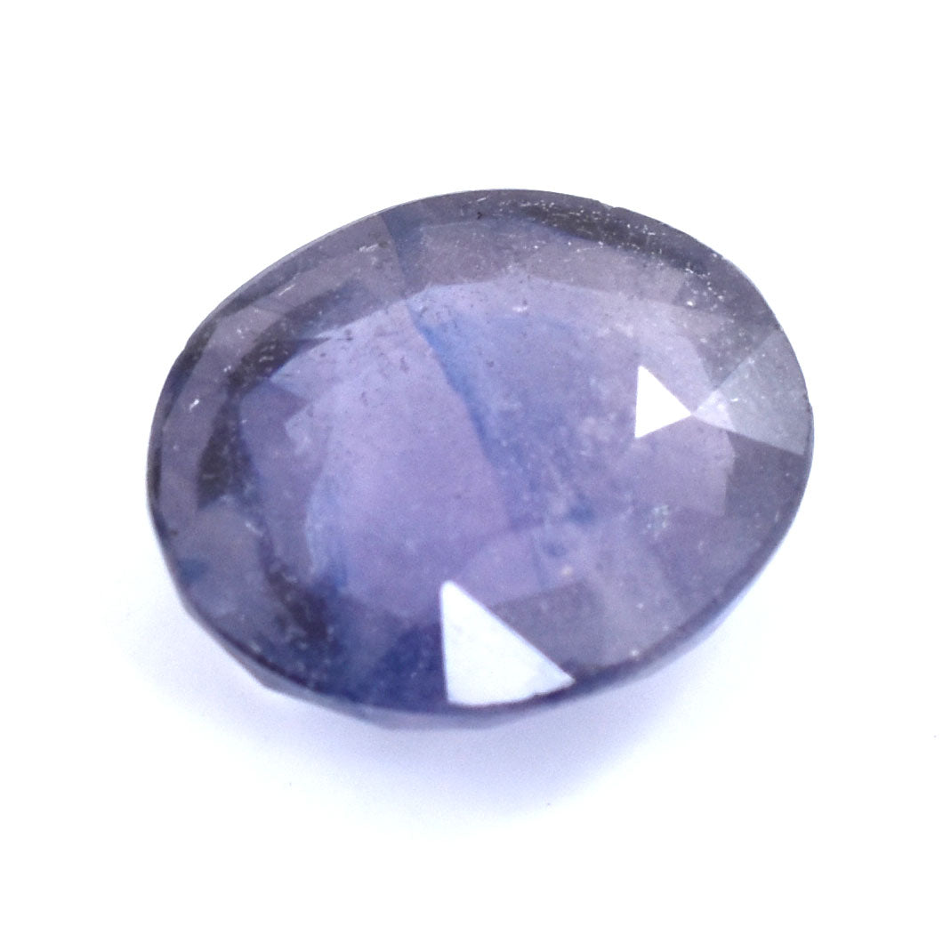 Oval-shaped purple gemstone with faceted cuts.