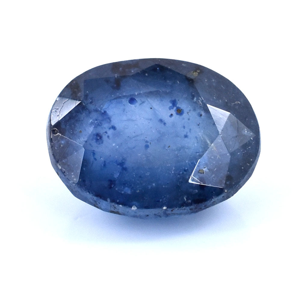 Oval-cut blue sapphire gemstone with visible inclusions.