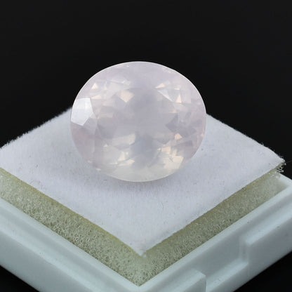 Translucent spherical gemstone with a soft, milky appearance.