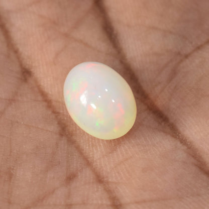 Opal gemstone with iridescent flashes of color.