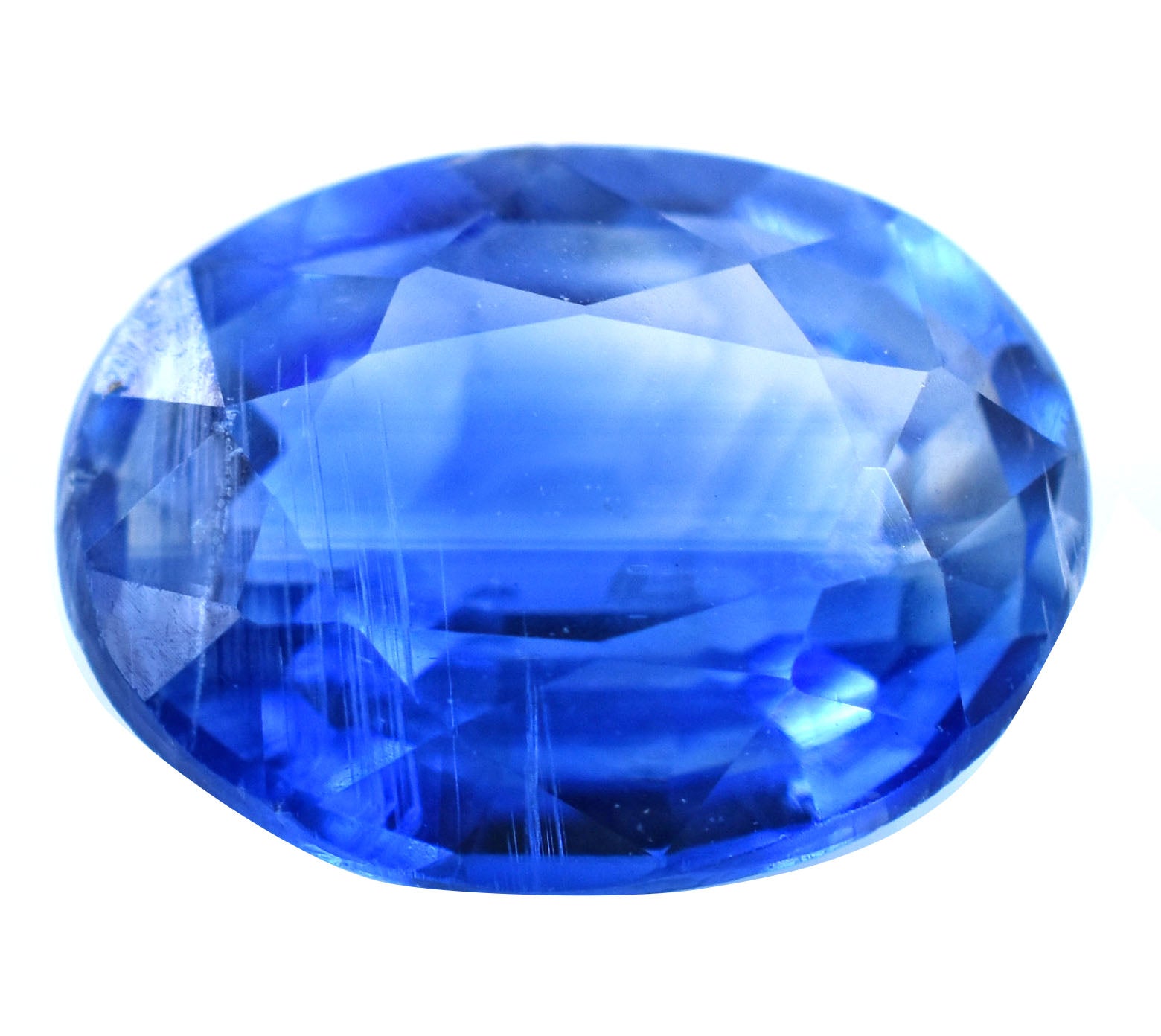 Brilliant blue oval-cut gemstone with faceted surfaces.