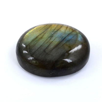 Polished labradorite gemstone with blue and green iridescence.