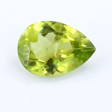 Pear-shaped green gemstone, likely peridot or chrysolite.