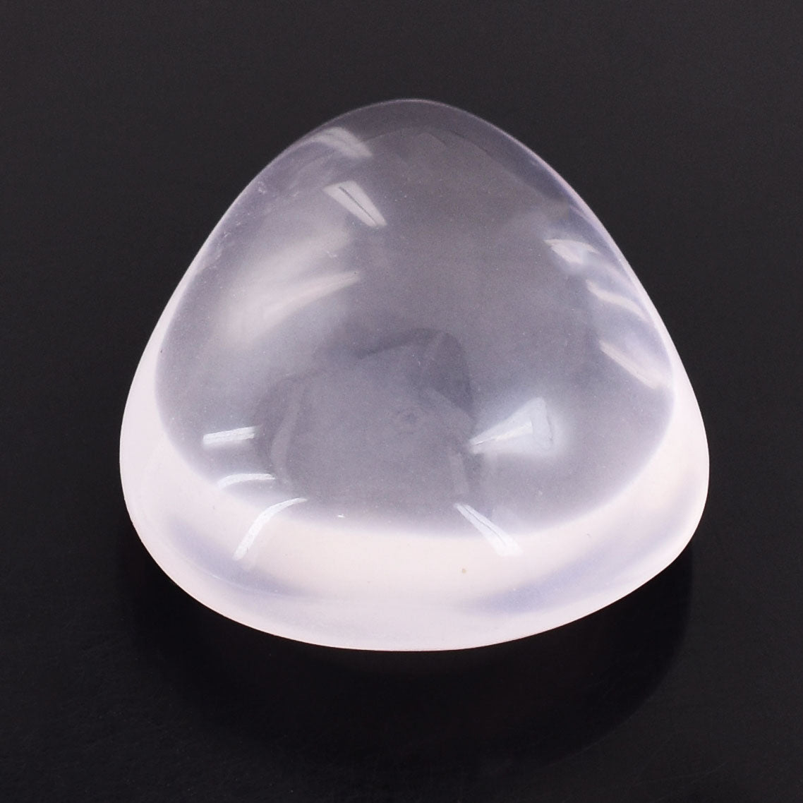 Triangular silicone breast prosthesis or implant.