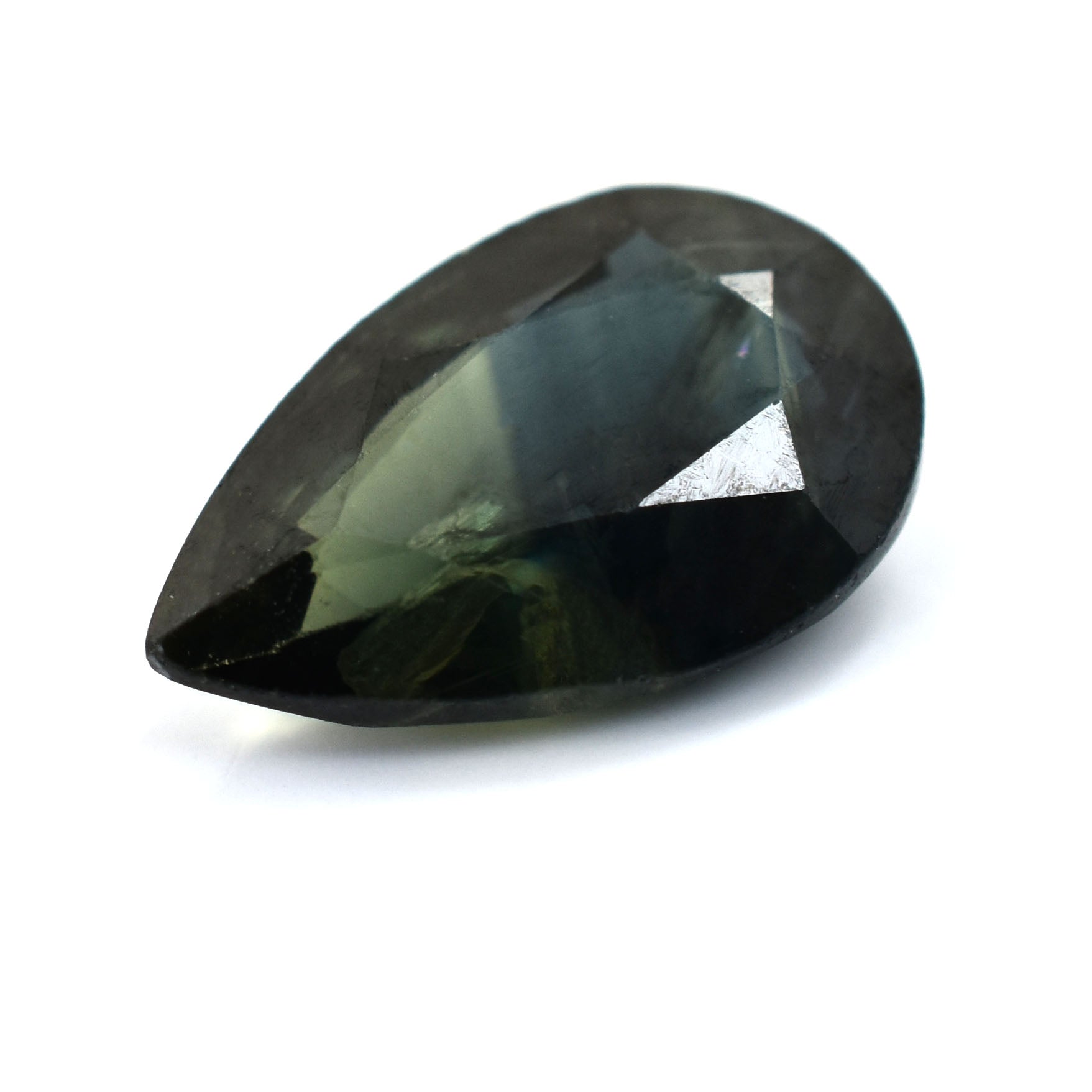 Teardrop-shaped dark green gemstone with faceted cut.