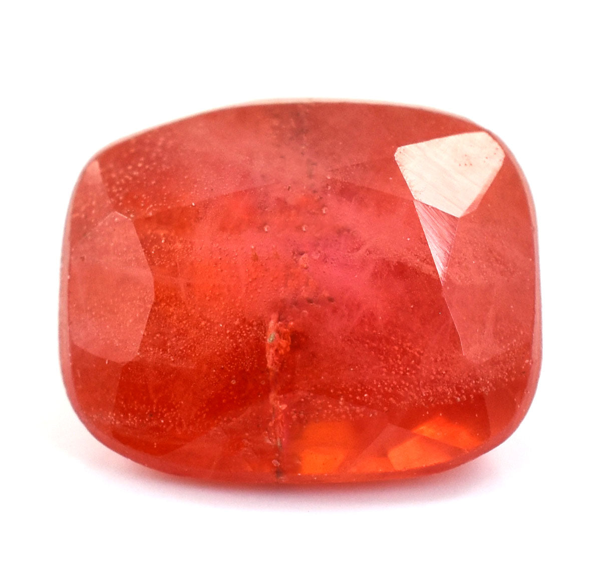 Faceted red gemstone with a cushion-cut shape.