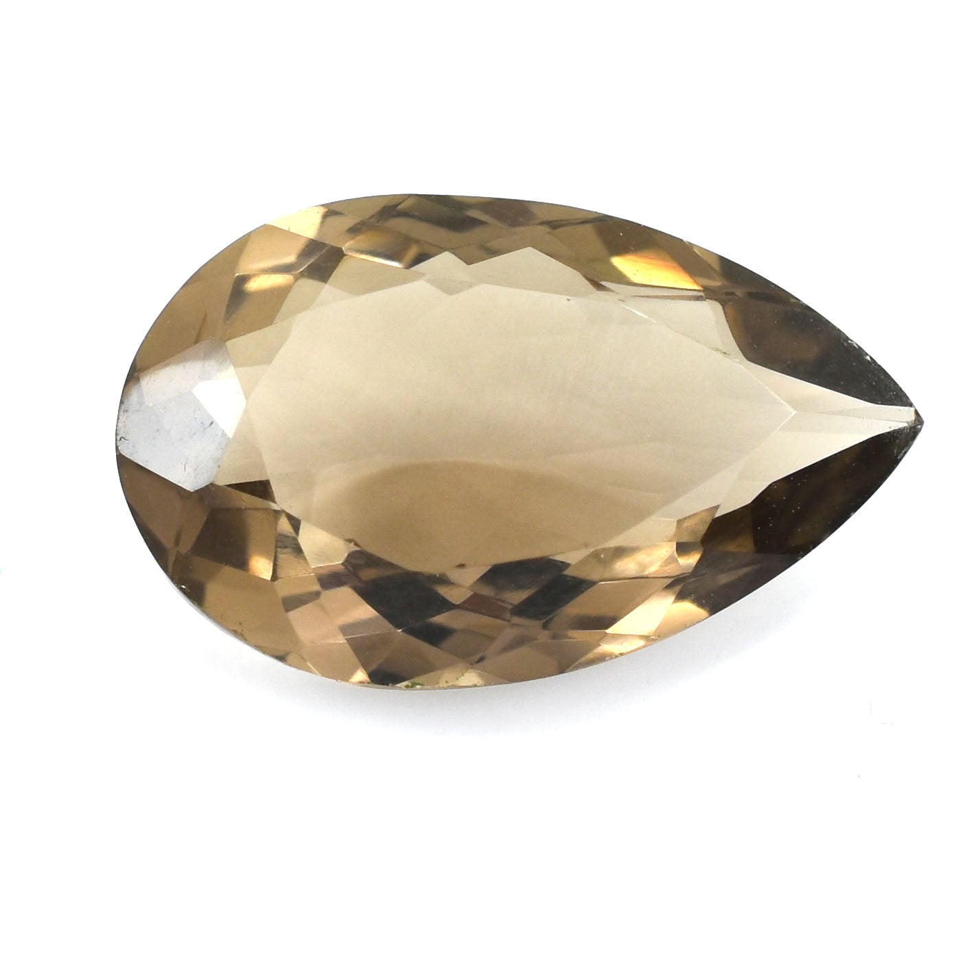 Pear-shaped, faceted gemstone with a light brown or champagne color.