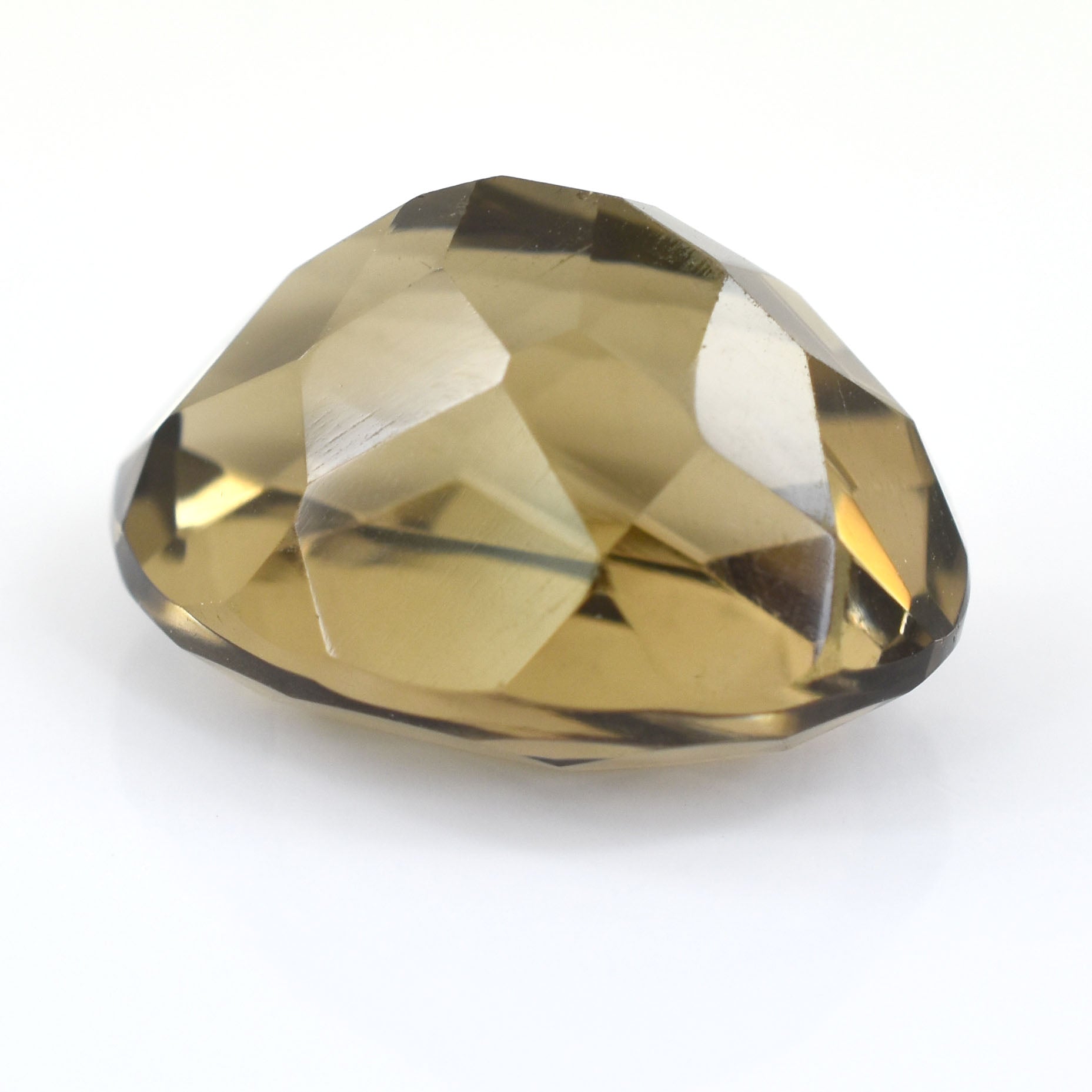 Faceted gemstone with a golden-brown hue.