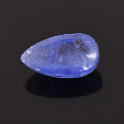 Teardrop-shaped blue gemstone with a smooth, polished surface.