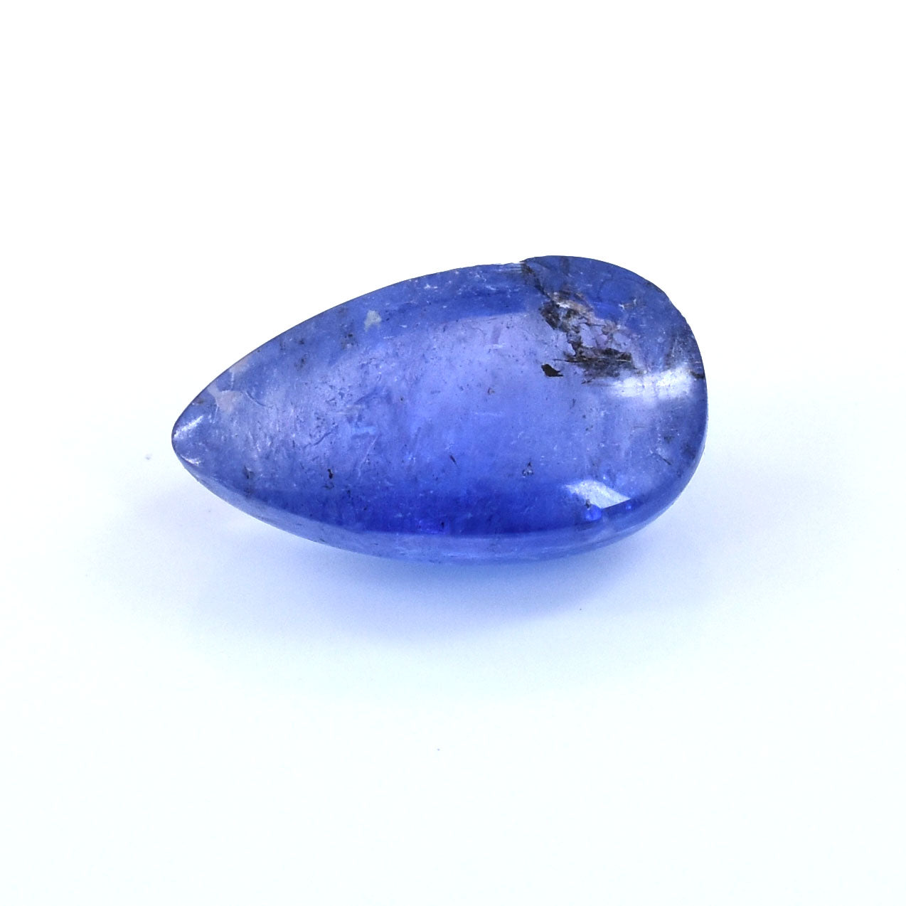 Teardrop-shaped blue gemstone with visible inclusions.